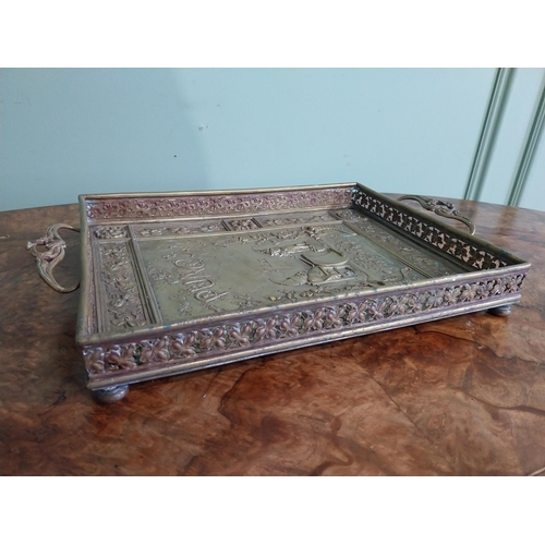 476 - Edwardian embossed brass Punch and Judy serving tray. {5 cm H x 36 cm W x 23 cm D}.