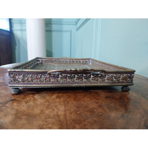 476 - Edwardian embossed brass Punch and Judy serving tray. {5 cm H x 36 cm W x 23 cm D}.