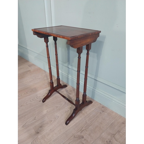 48 - Regency rosewood lamp table on faux bamboo shaped supports and single turned stretcher and shaped fe... 