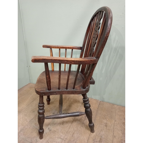 481 - Oak wheelback Windsor armchair with turned legs.  {H 100cm x W 52cm x D 50cm}.NOT AVAILABLE TO VIEW ... 