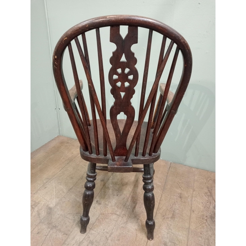 481 - Oak wheelback Windsor armchair with turned legs.  {H 100cm x W 52cm x D 50cm}.NOT AVAILABLE TO VIEW ... 