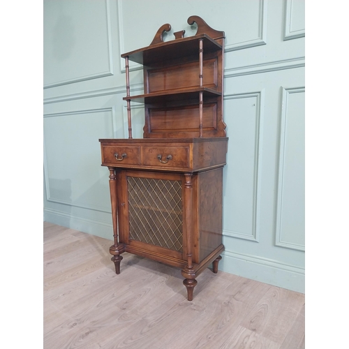 483 - Good quality yew wood side cabinet in the Regency style fitted with two shelves and two short drawer... 