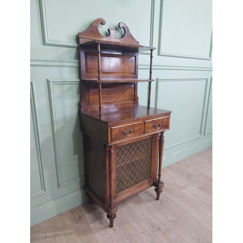 483 - Good quality yew wood side cabinet in the Regency style fitted with two shelves and two short drawer... 