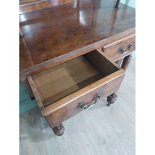 483 - Good quality yew wood side cabinet in the Regency style fitted with two shelves and two short drawer... 