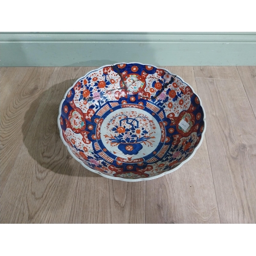 486 - Large 19th C. Oriental ceramic Imari bowl. (damaged){13 cm H x 38 cm Dia.}.