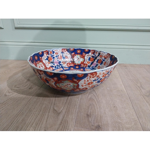 486 - Large 19th C. Oriental ceramic Imari bowl. (damaged){13 cm H x 38 cm Dia.}.