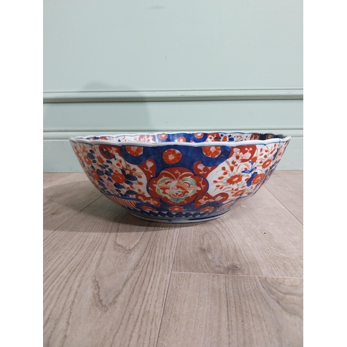 486 - Large 19th C. Oriental ceramic Imari bowl. (damaged){13 cm H x 38 cm Dia.}.