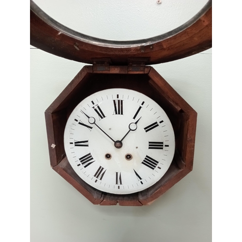 49 - Mahogany and brass circular wall clock {D 12cm x D18cm}. NOT AVAILABLE TO VIEW IN PERSON.