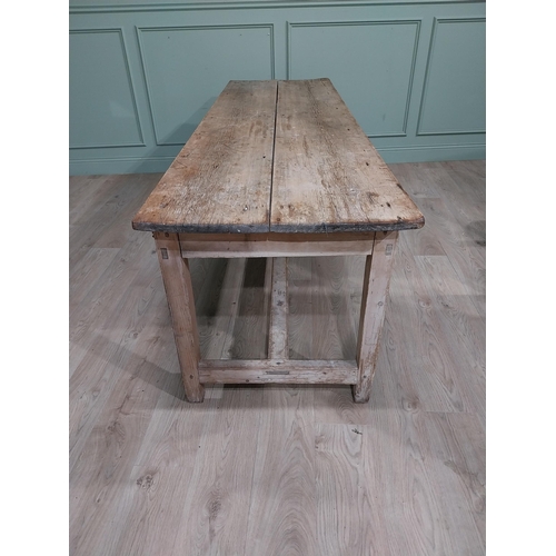 499 - 19th C. Irish scrubbed pine two plank kitchen table on square legs and single stretcher. {74 cm H x ... 