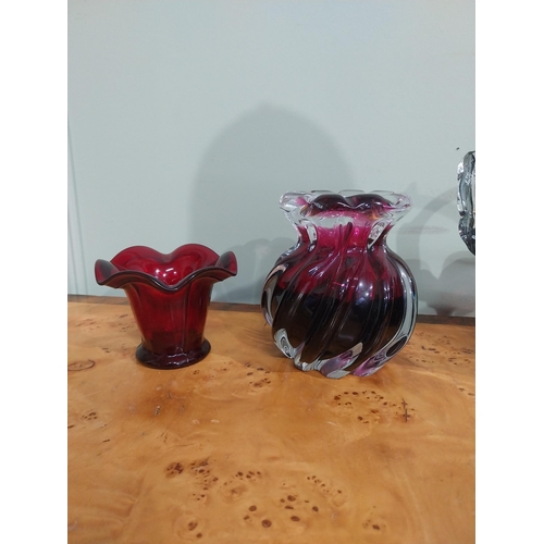 503 - Five pieces of ruby glass � basket and four vases. {22 cm H to 8 cm H}.