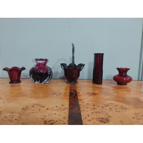 503 - Five pieces of ruby glass � basket and four vases. {22 cm H to 8 cm H}.