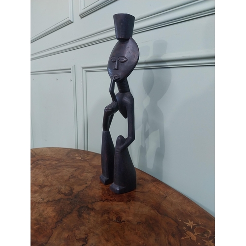 507 - Carved hardwood African figure of Man smoking pipe. {50 cm H x 13 cm W x 9 cm D}.