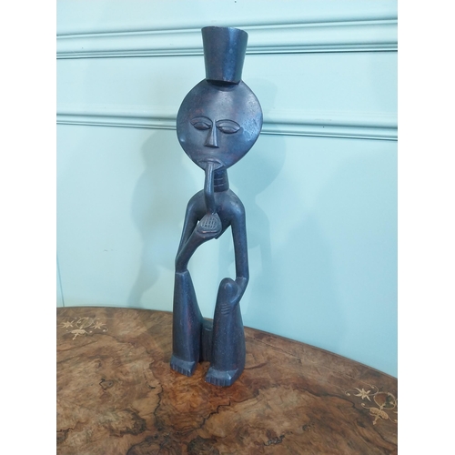 507 - Carved hardwood African figure of Man smoking pipe. {50 cm H x 13 cm W x 9 cm D}.