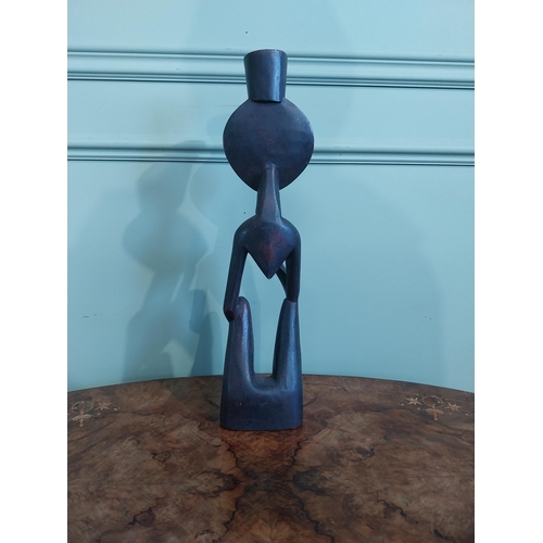 507 - Carved hardwood African figure of Man smoking pipe. {50 cm H x 13 cm W x 9 cm D}.