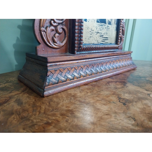 511 - Edwardian mahogany Gingerbread clock with painted dial. {59 cm H x 39 cm W x 13 cm D}.