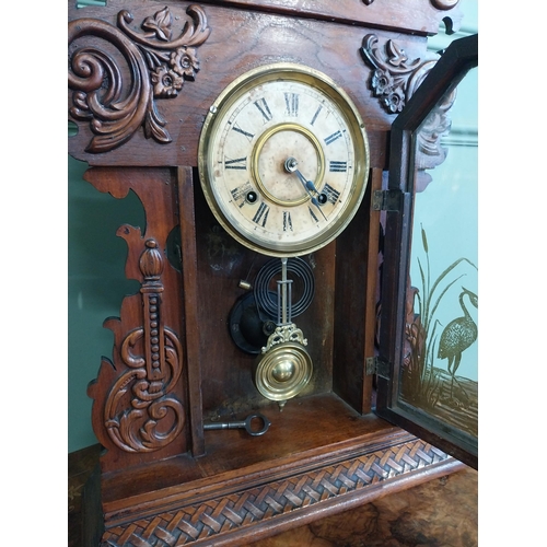 511 - Edwardian mahogany Gingerbread clock with painted dial. {59 cm H x 39 cm W x 13 cm D}.