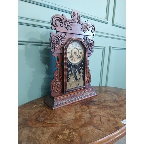 511 - Edwardian mahogany Gingerbread clock with painted dial. {59 cm H x 39 cm W x 13 cm D}.