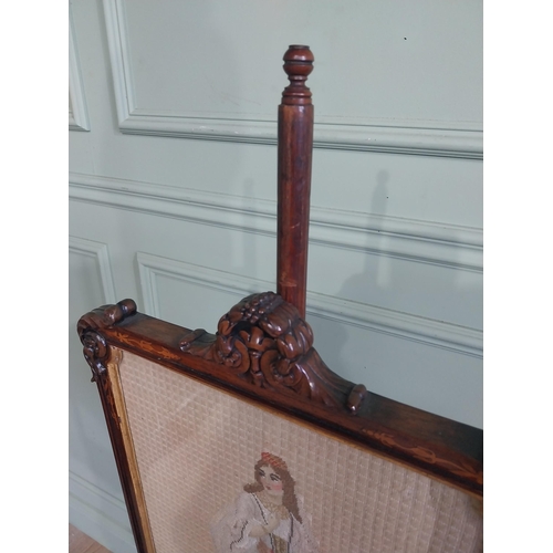 514 - William IV rosewood pole fire screen on single turned column raised on platform base and castors. {1... 