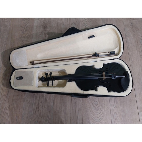 519 - Cased violin.