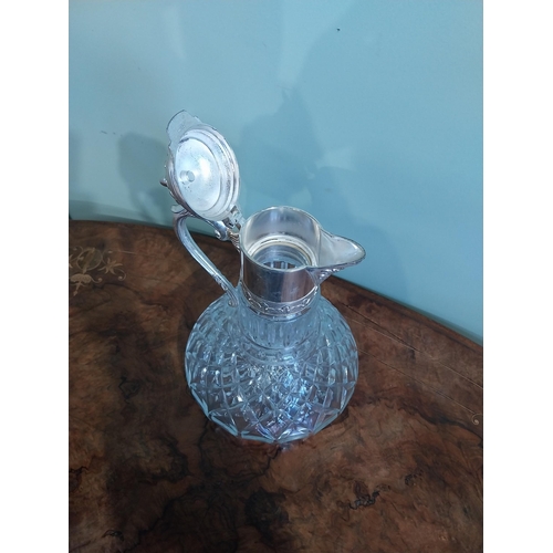 520 - Silver plate and moulded glass claret jug. {27 cm H x 19 cm Dia.}.