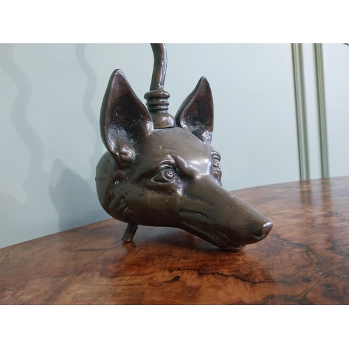 521 - Bronze doorstop in the form of a Fox�s head. {57 cm H x 13 cm W  x 7 cm D}