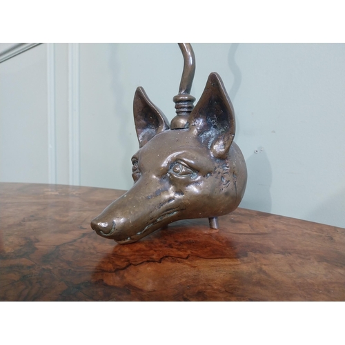 521 - Bronze doorstop in the form of a Fox�s head. {57 cm H x 13 cm W  x 7 cm D}