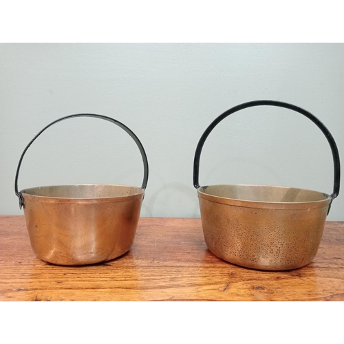 527 - Pair of brass preserving pans.  {H 24cm x Dia 20cm H 20cm x D 18cm