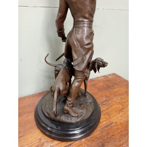 53 - Large Bronze statue of Hunter with horn and two hound dogs.  {H 72cm x Dia 33cm}. NOT AVAILABLE TO V... 