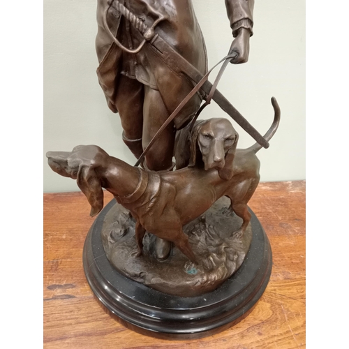 53 - Large Bronze statue of Hunter with horn and two hound dogs.  {H 72cm x Dia 33cm}. NOT AVAILABLE TO V... 