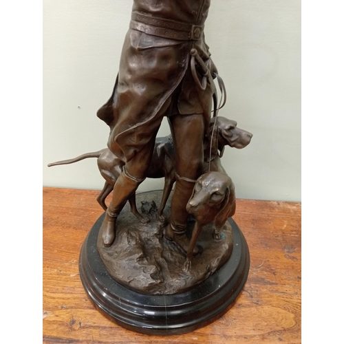 53 - Large Bronze statue of Hunter with horn and two hound dogs.  {H 72cm x Dia 33cm}. NOT AVAILABLE TO V... 