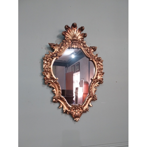 530 - French gilt wall mirror in the Victorian style. {56 cm H x 36 cm W}.