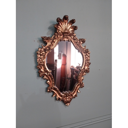 530 - French gilt wall mirror in the Victorian style. {56 cm H x 36 cm W}.