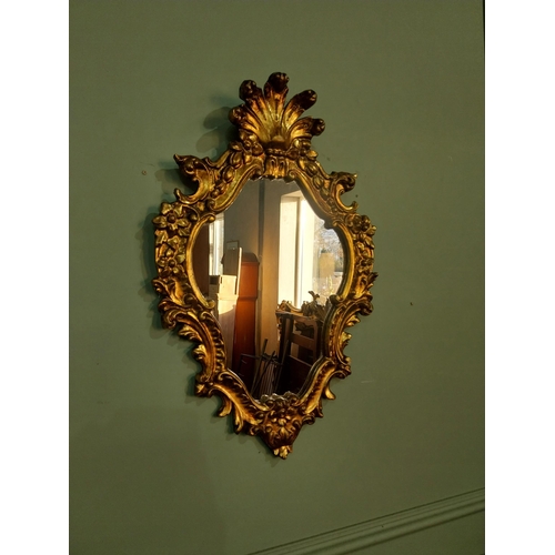 530 - French gilt wall mirror in the Victorian style. {56 cm H x 36 cm W}.