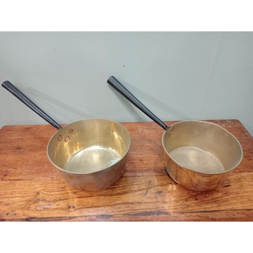 533 - Pair of brass saucepans  {H 11cm x D 22 cm H 10cm x D 21cm}.  NOT AVAILABLE TO VIEW IN PERSON