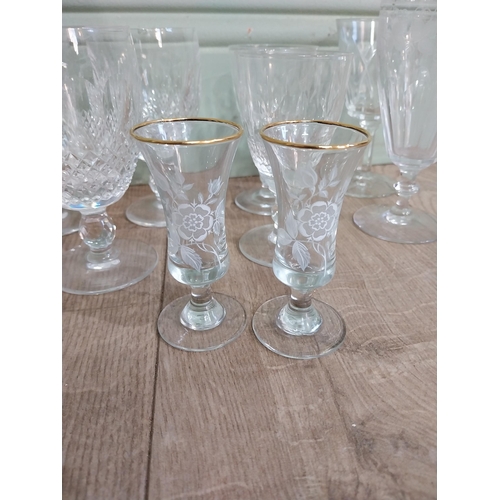 537 - Large collection of nine Waterford cut glass crystal glasses and other glass vases and candle holder... 