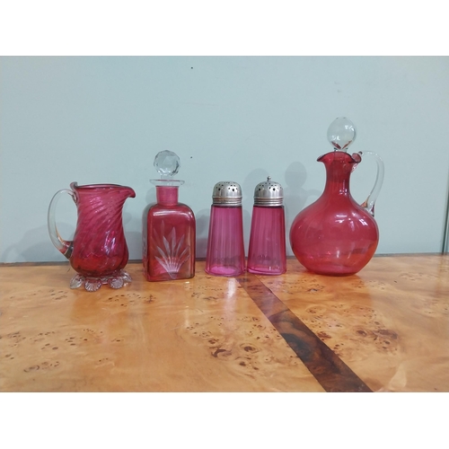 54 - Collection of Victorian ruby glass � Lidded jug, decanter, two sugar sifters and jug. {24 cm H  to 1... 