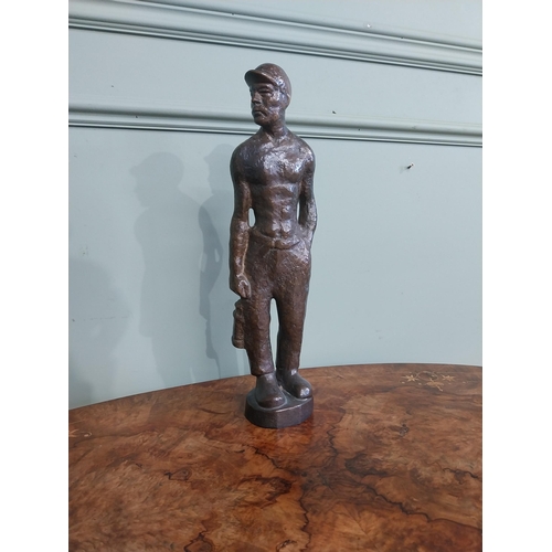 540 - Bronze doorstop in the form of a Miner. {40 cm H x 13 cm W x 7 cm D}.