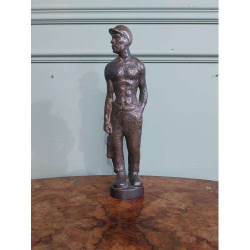 540 - Bronze doorstop in the form of a Miner. {40 cm H x 13 cm W x 7 cm D}.