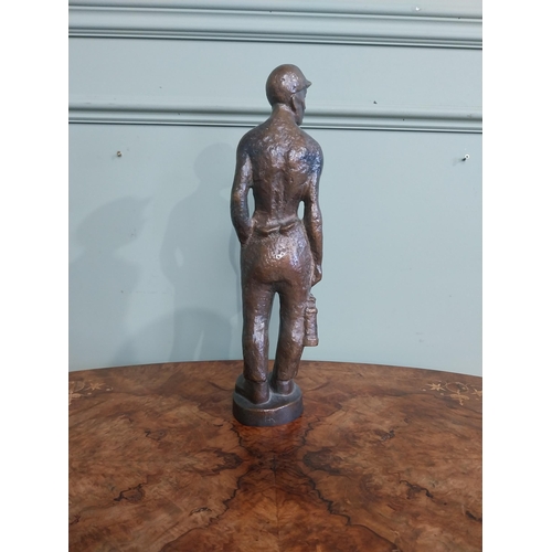 540 - Bronze doorstop in the form of a Miner. {40 cm H x 13 cm W x 7 cm D}.