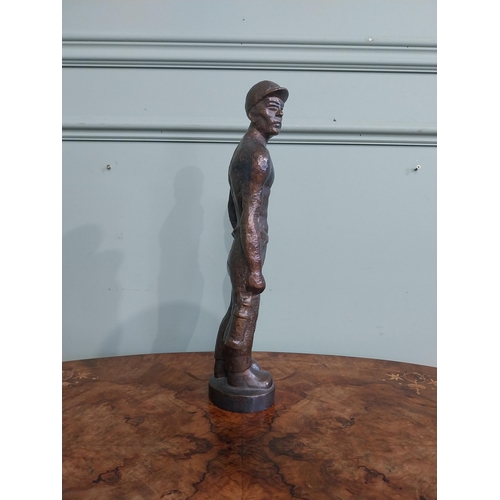 540 - Bronze doorstop in the form of a Miner. {40 cm H x 13 cm W x 7 cm D}.