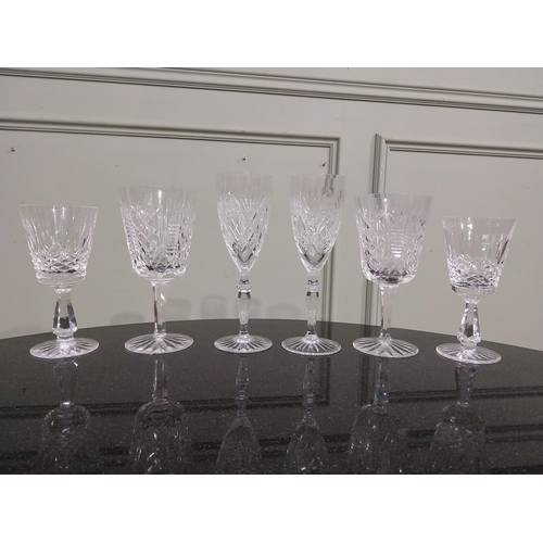 542 - Six cut crystal wine glasses including some Waterford. {18 cm H to 15 cm H}