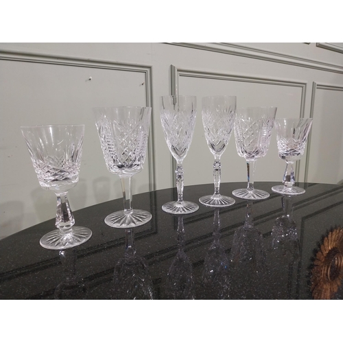 542 - Six cut crystal wine glasses including some Waterford. {18 cm H to 15 cm H}