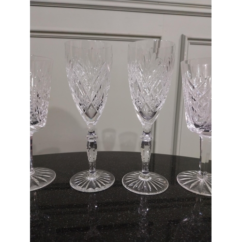 542 - Six cut crystal wine glasses including some Waterford. {18 cm H to 15 cm H}