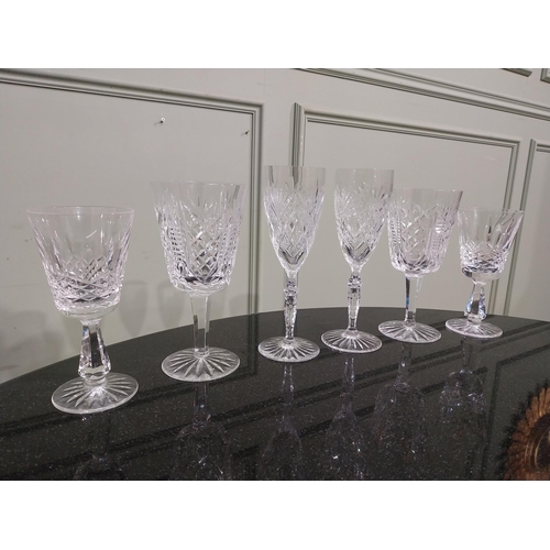 542 - Six cut crystal wine glasses including some Waterford. {18 cm H to 15 cm H}