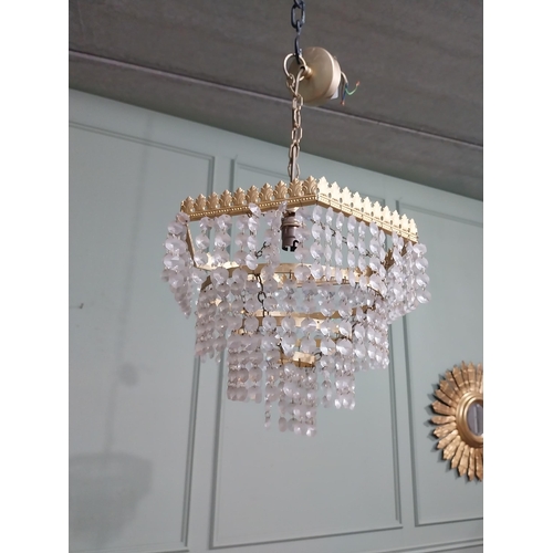 547 - 1950�s French gilded brass and crystal drop three tier chandelier. {54 cm H x 27 cm Dia.}.