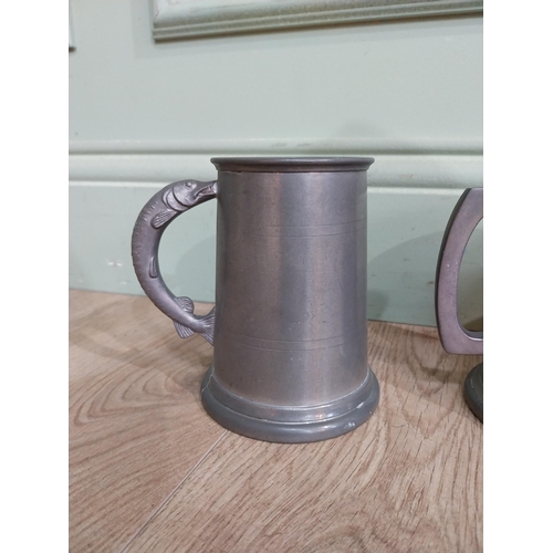 548 - Five pewter tankards one with fishing reference �the one that got away�. {13 cm H x 12 cm Dia.}.