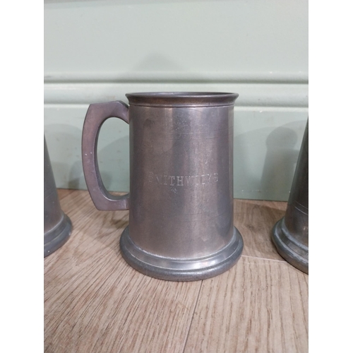 548 - Five pewter tankards one with fishing reference �the one that got away�. {13 cm H x 12 cm Dia.}.