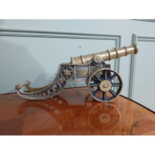 557 - Pair of good quality brass desk cannons. {20 cm H x 43 cm W x 13 cm D}.