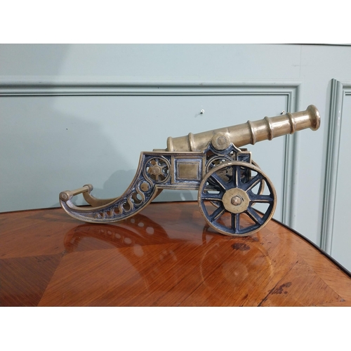 557 - Pair of good quality brass desk cannons. {20 cm H x 43 cm W x 13 cm D}.