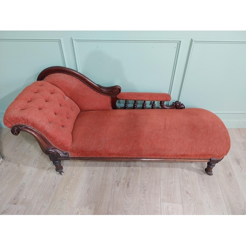 559 - 19th C. Carved mahogany and upholstered chaise longue on turned legs and castors. {80 cm H x 195 cm ... 